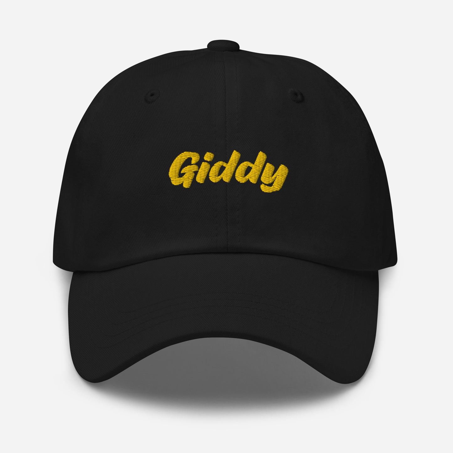 Austin city editions with “Giddy” type in yellow embroidery on black casual dad hat front view on white background