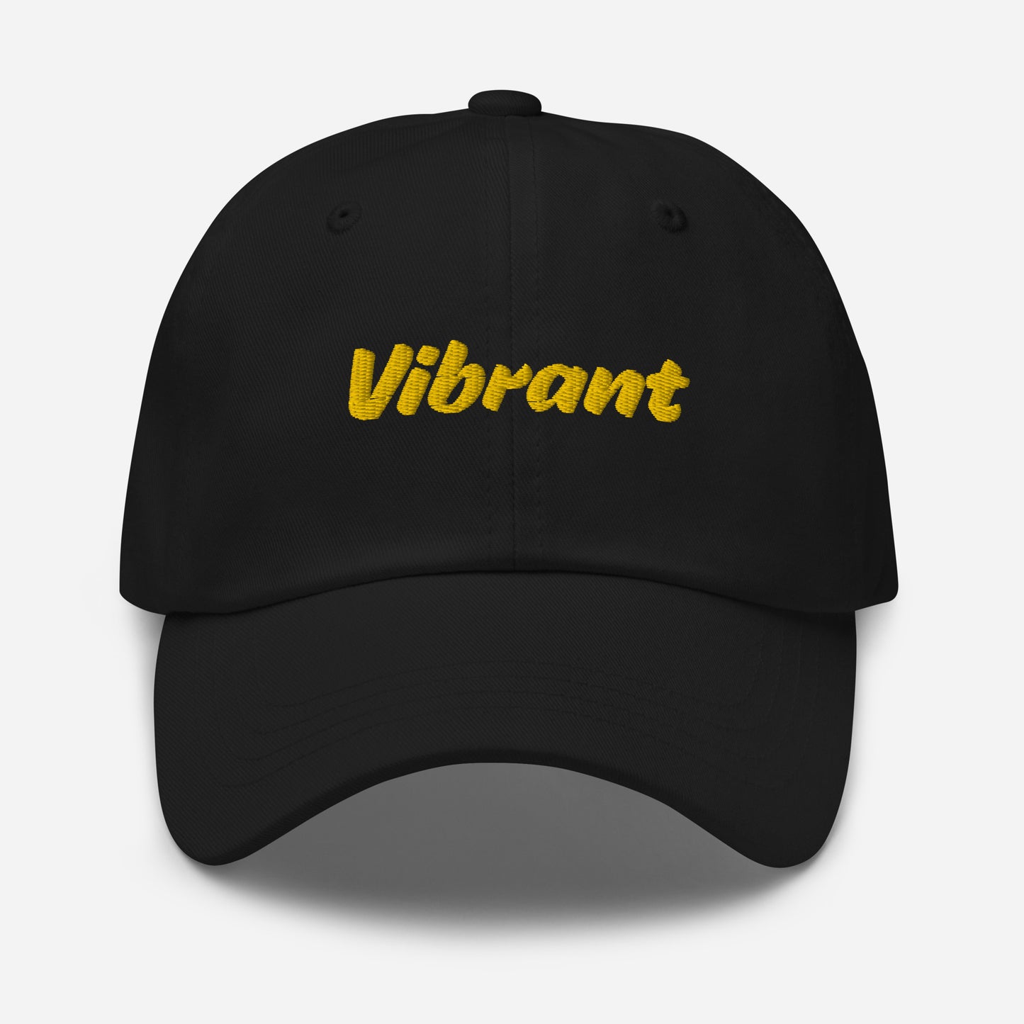 Austin city editions with “Vibrant” type in yellow embroidery on black casual dad hat front view on white background