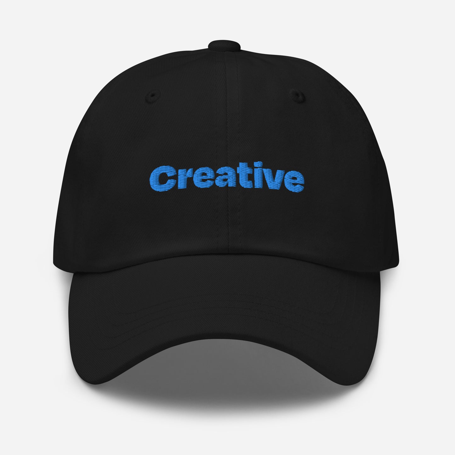 Chicago city editions with “Creative” type in blue embroidery on black casual dad hat front view on white background