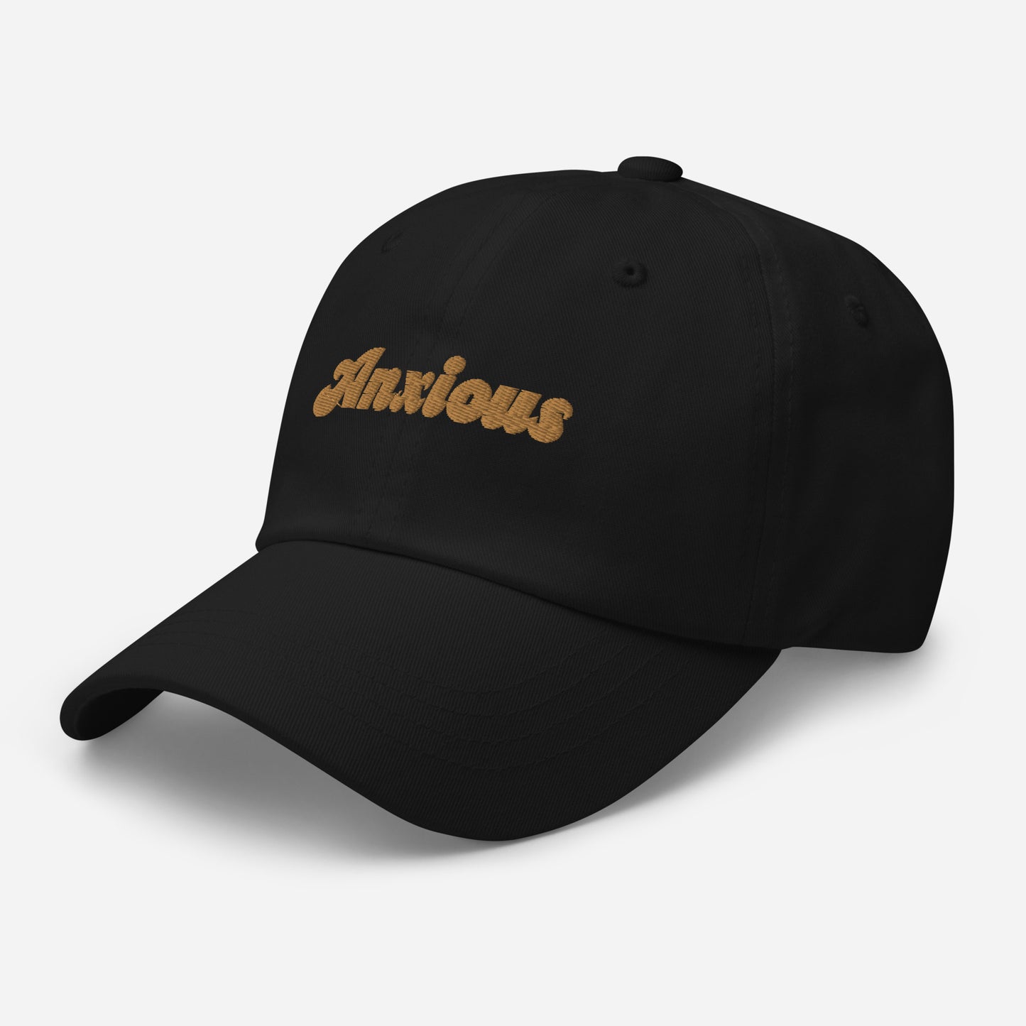 Portland city editions with “Anxious” type in gold embroidery on black casual dad hat front side view on white background
