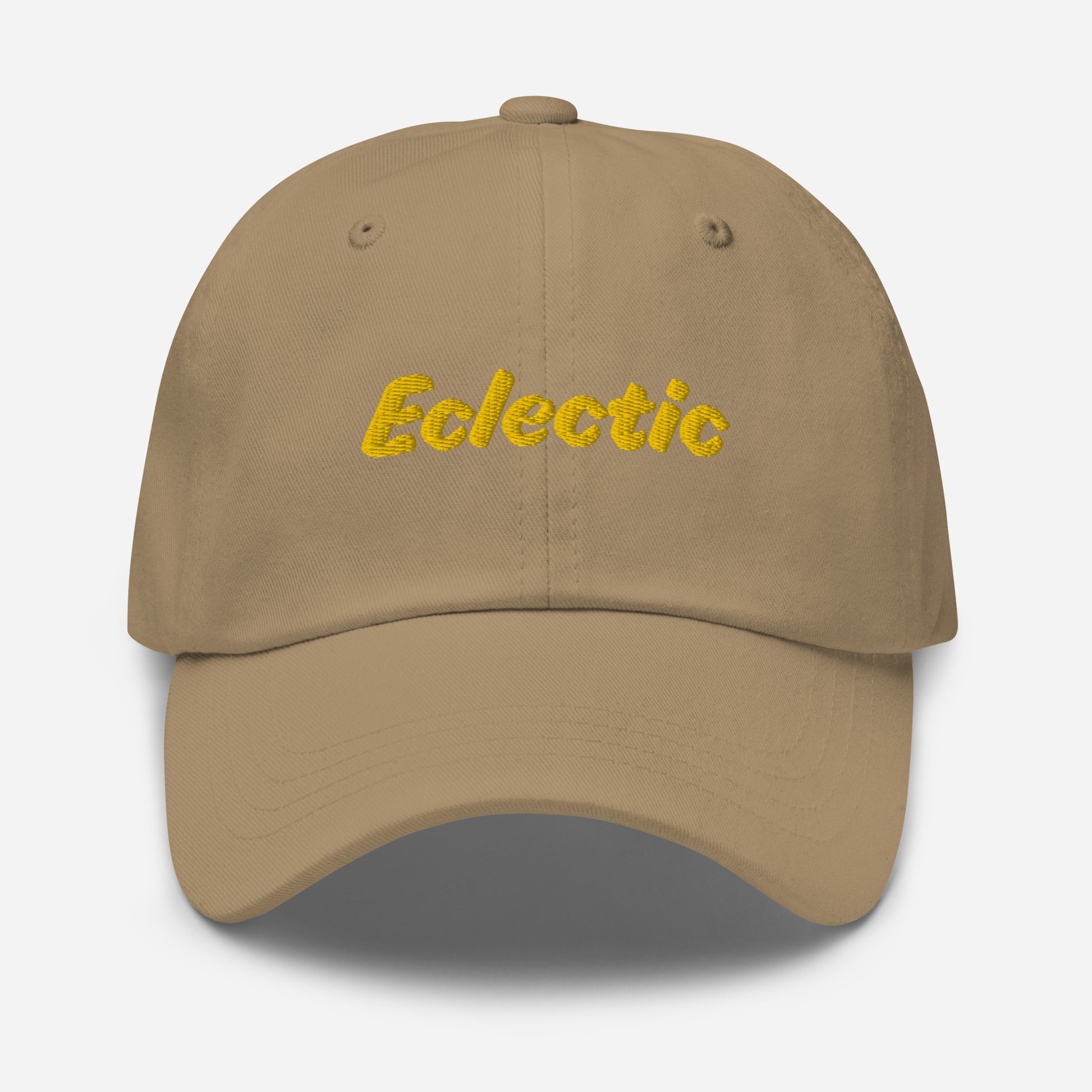Austin city editions with “Eclectic” type in yellow embroidery on khaki casual dad hat front view on white background