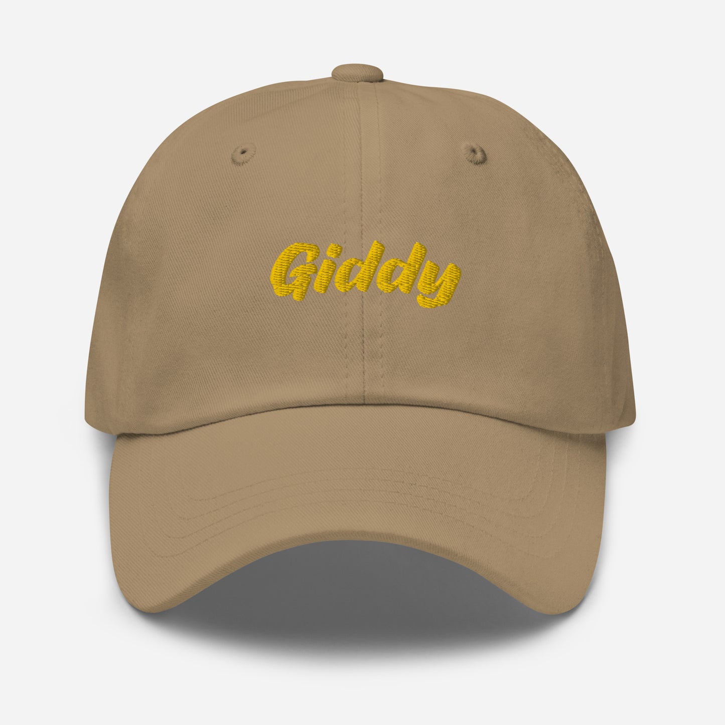 Austin city editions with “Giddy” type in yellow embroidery on khaki casual dad hat front view on white background