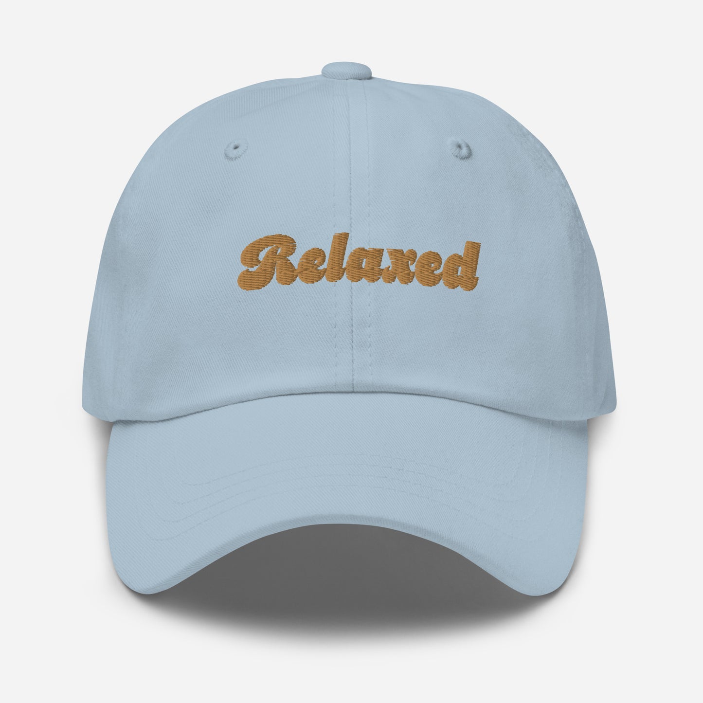 Portland city editions with “Relaxed” type in gold embroidery on light blue casual dad hat front view on white background