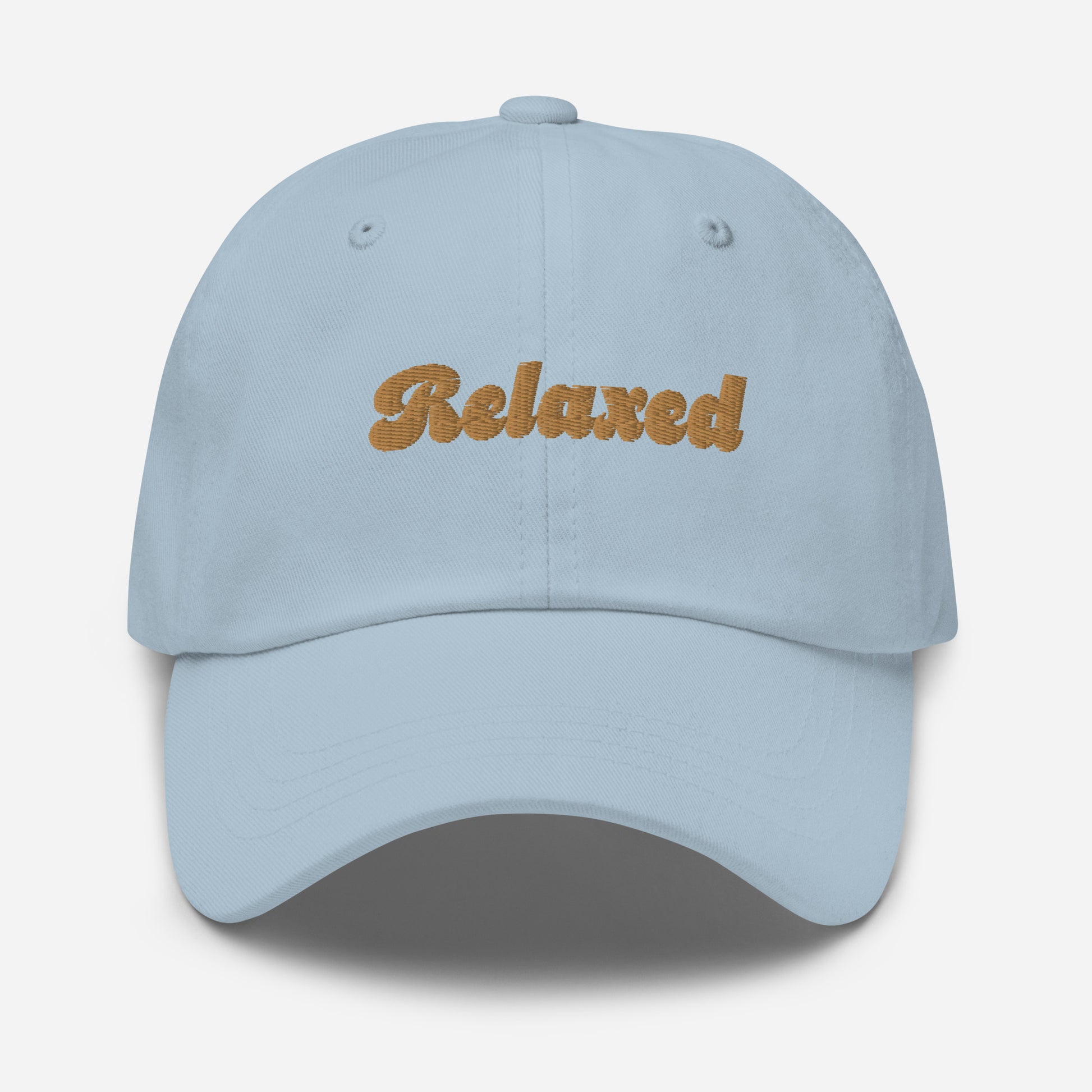 Portland city editions with “Relaxed” type in gold embroidery on light blue casual dad hat front view on white background