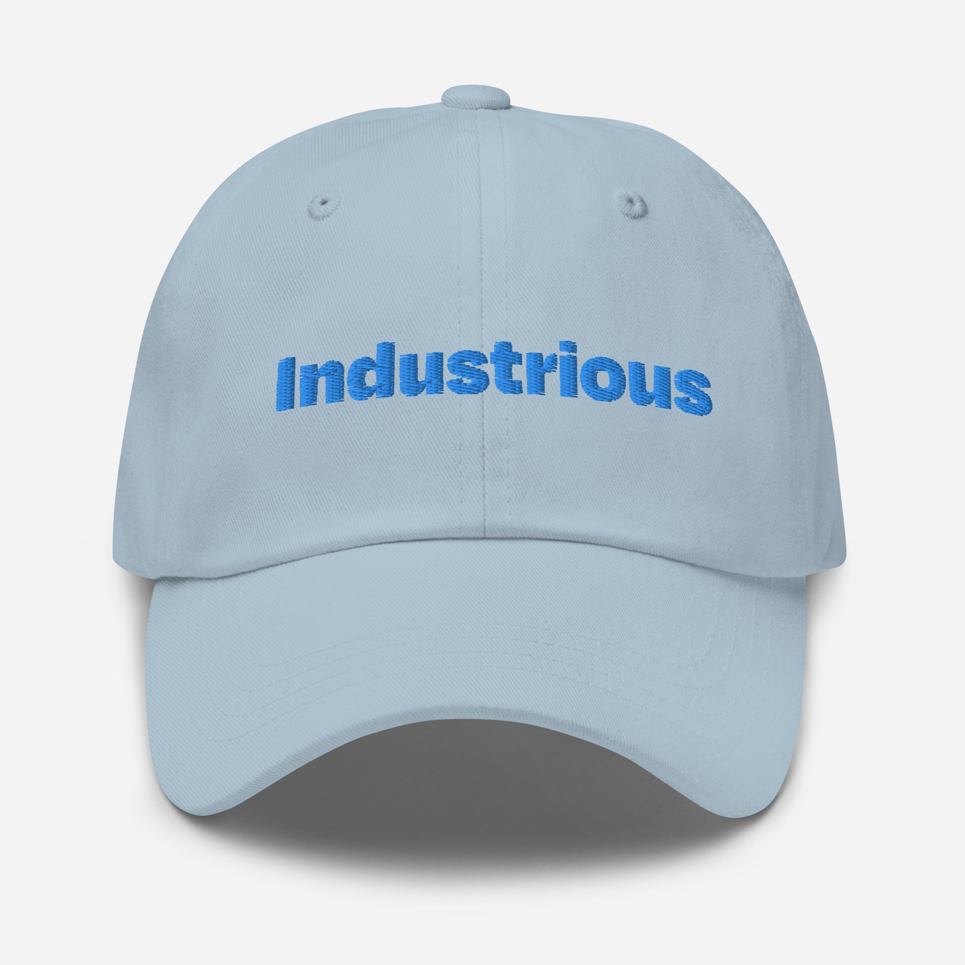 Chicago city editions with “Industrious” type in blue embroidery on light blue casual dad hat front view on white background