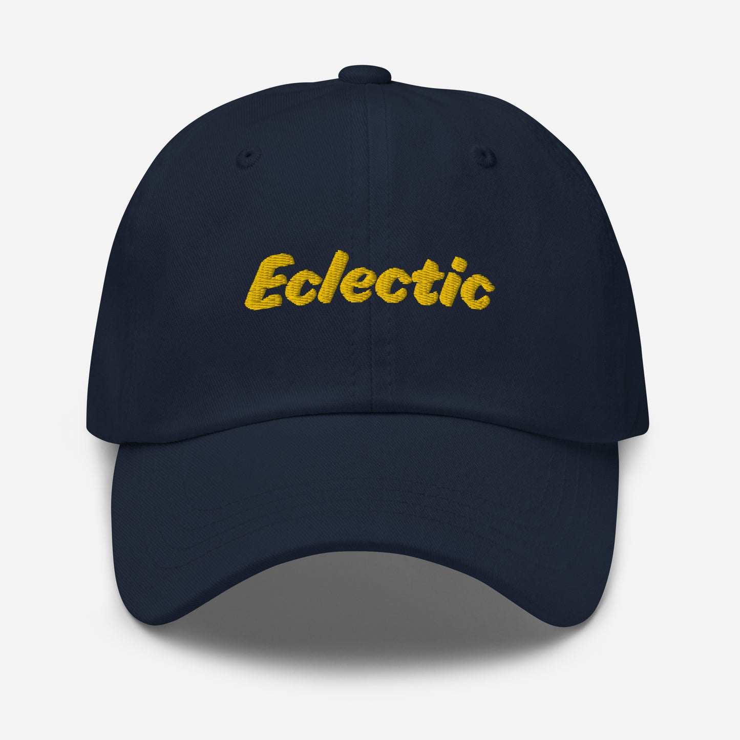 Austin city editions with “Eclectic” type in yellow embroidery on navy casual dad hat front view on white background
