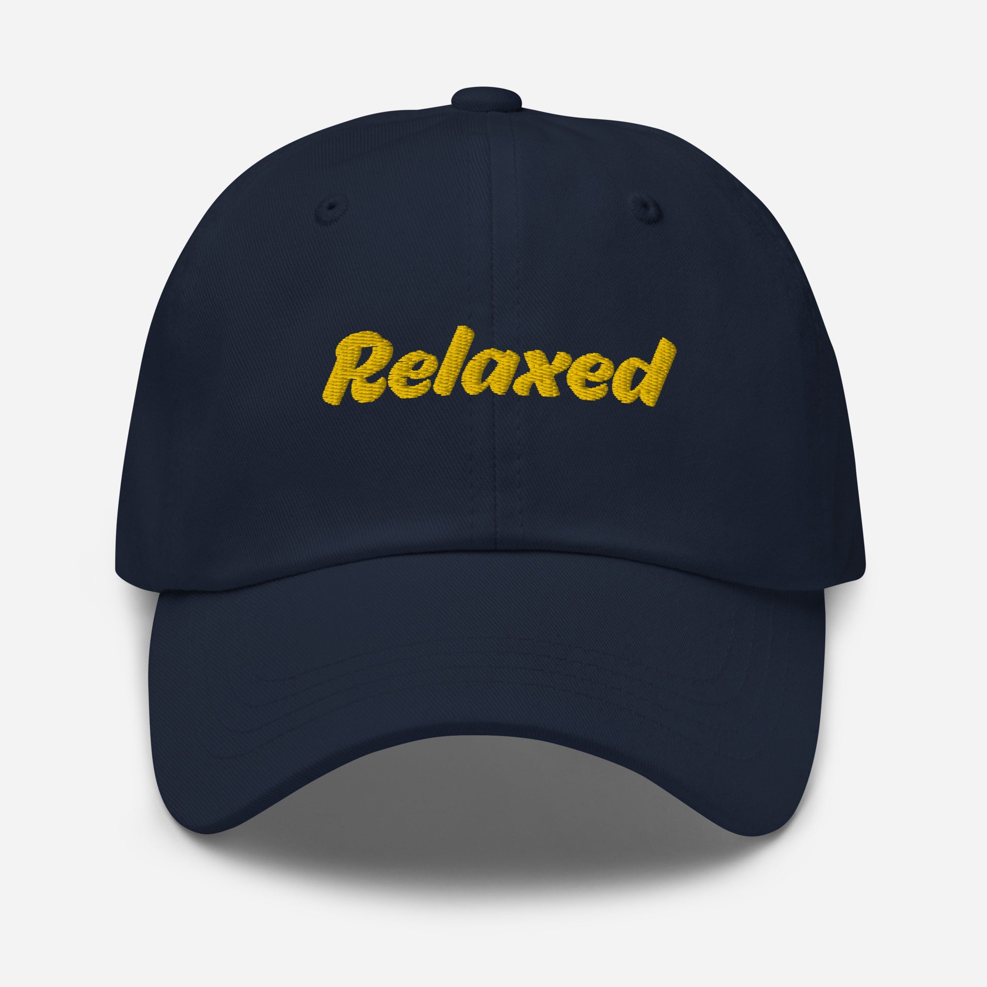 Austin city editions with “Relaxed” type in yellow embroidery on navy casual dad hat front view on white background