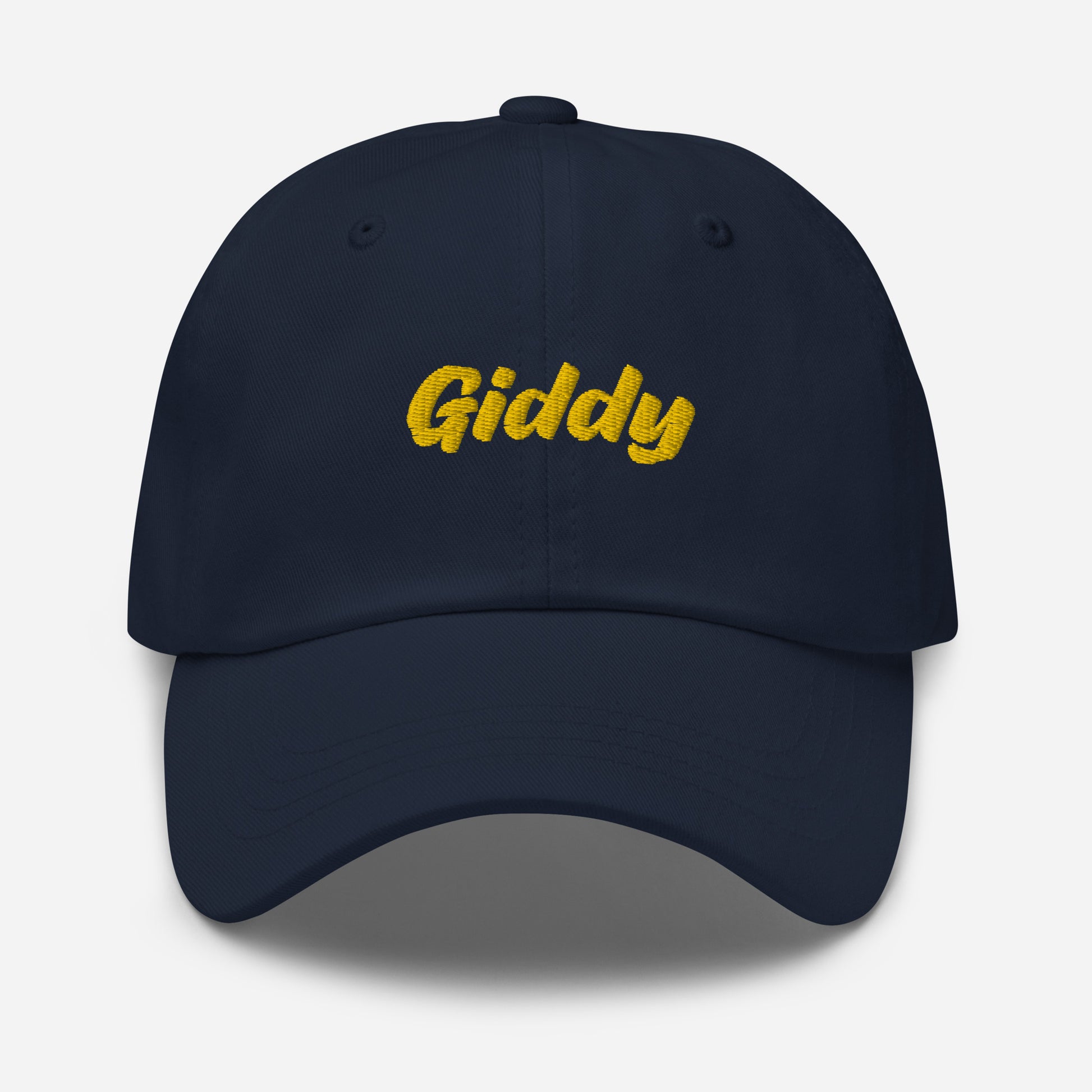 Austin city editions with “Giddy” type in yellow embroidery on navy casual dad hat front view on white background