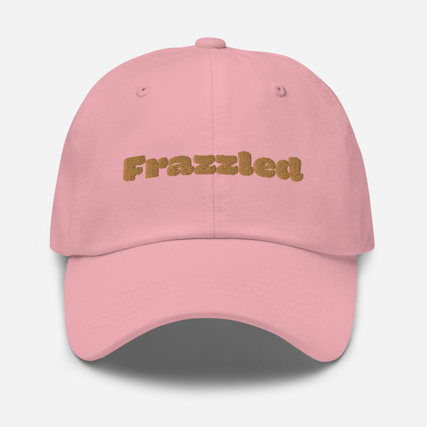 Los Angeles city editions with “Frazzled” type in gold embroidery on pink casual dad hat front view on white background
