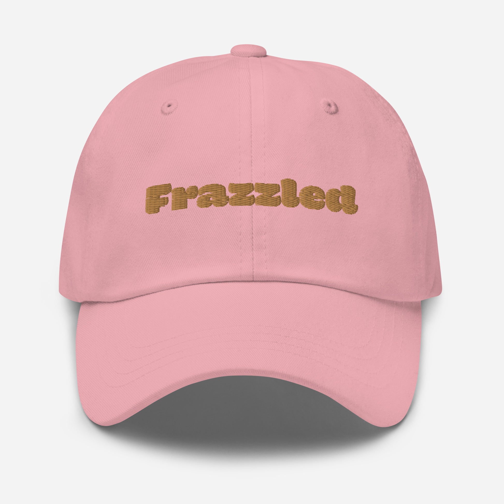 Los Angeles city editions with “Frazzled” type in gold embroidery on pink casual dad hat front view on white background