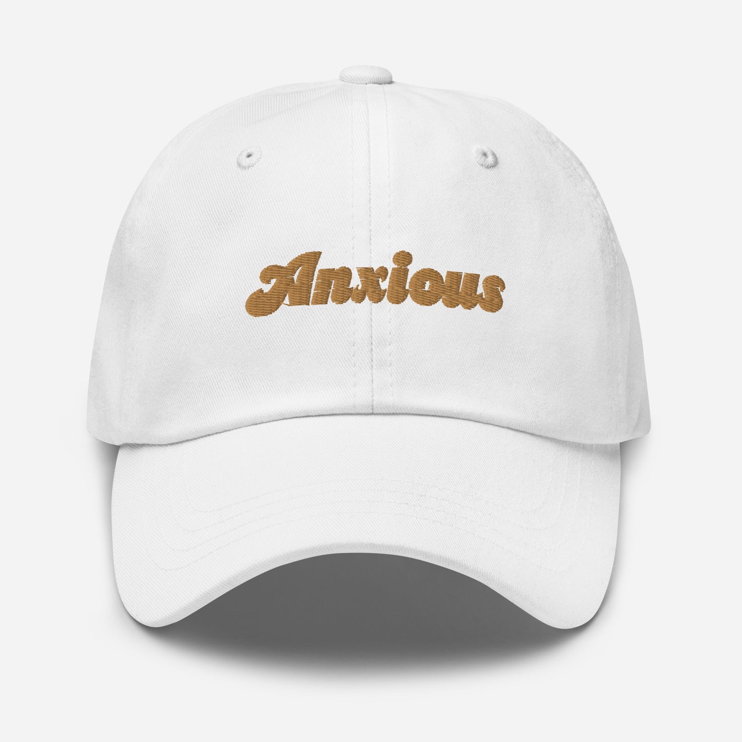 Portland city editions with “Anxious” type in gold embroidery on white casual dad hat front view on white background