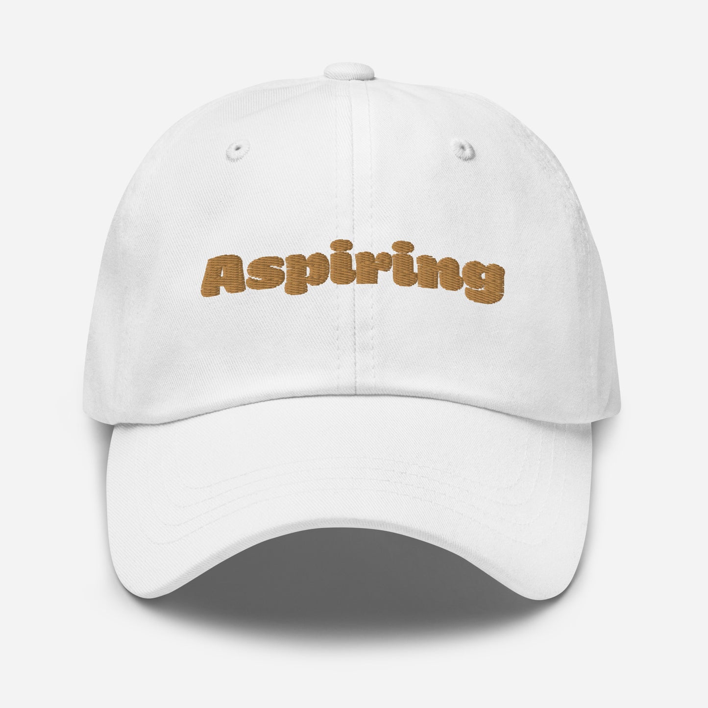Los Angeles city editions with “Aspiring” type in gold embroidery on white casual dad hat front view on white background
