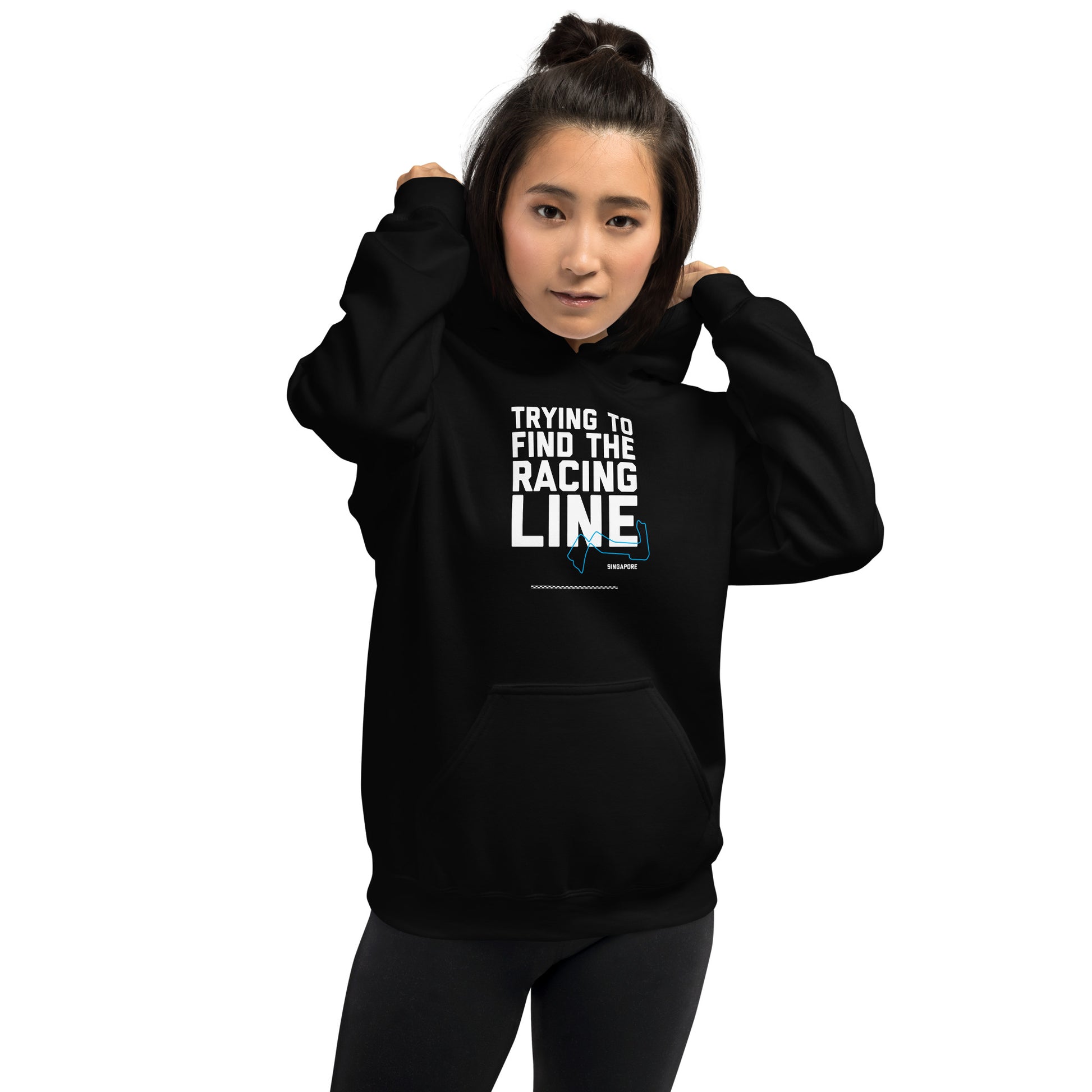 Trying To Find The Racing Line text on black hoodie, front view on female model