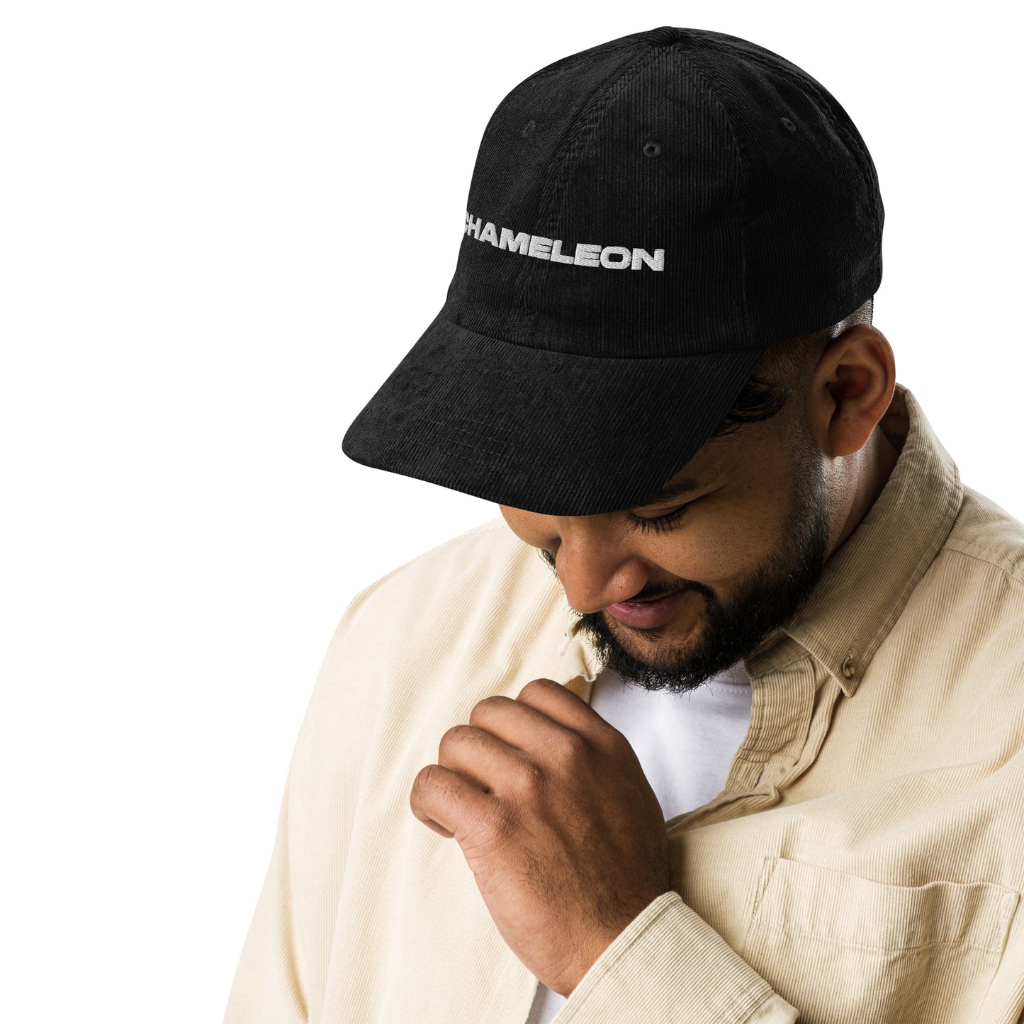 CHAMELEON, text, type, hat, dad hat, corduroy, cozy, design. front right side view of black hat on male model