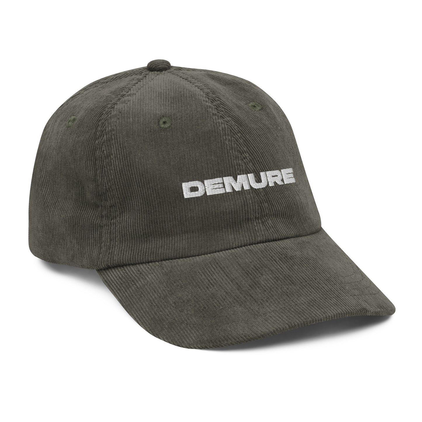 DEMURE, text, type, hat, dad hat, corduroy, cozy, design. front left side view of olive hat on white background