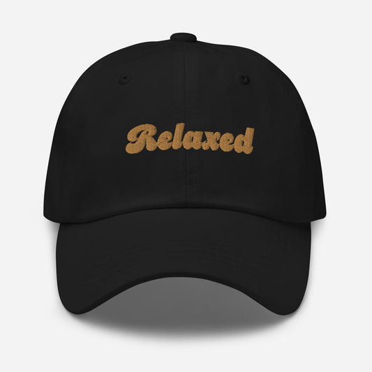 Portland city editions with “Relaxed” type in gold embroidery on black casual dad hat front view on white background