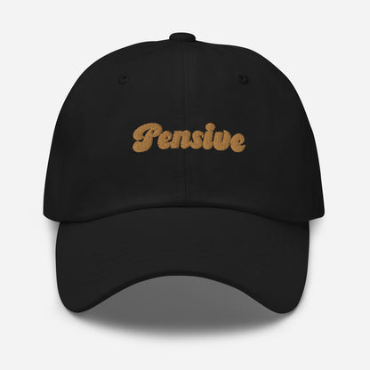 Portland city editions with “Pensive” type in gold embroidery on black casual dad hat front view on white background