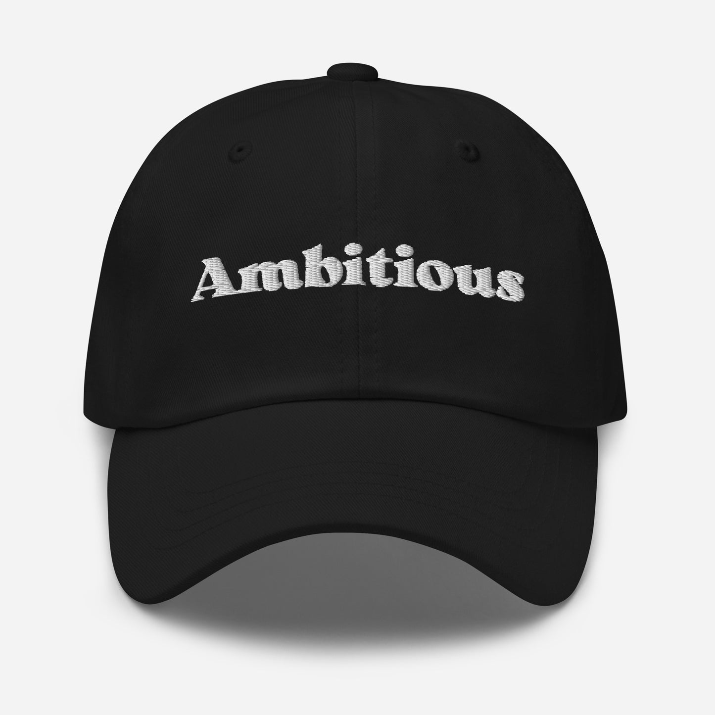 New York city editions with “Ambitious” type in white embroidery on black casual dad hat front view on white background