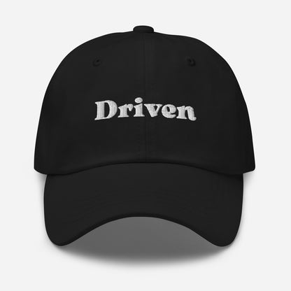 New York city editions with “Driven” type in white embroidery on black casual dad hat front view on white background