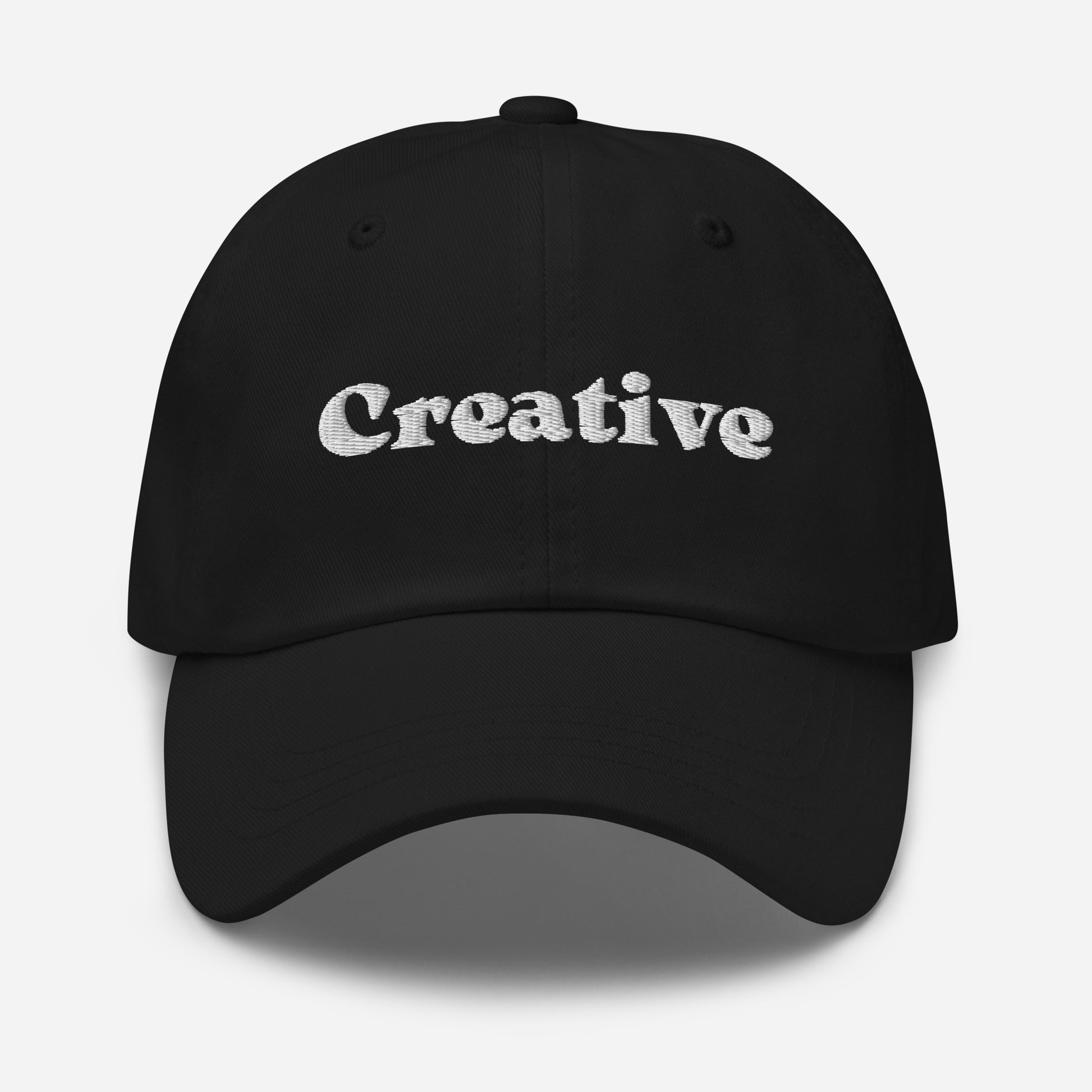 New York city editions with “Creative” type in white embroidery on black casual dad hat front view on white background