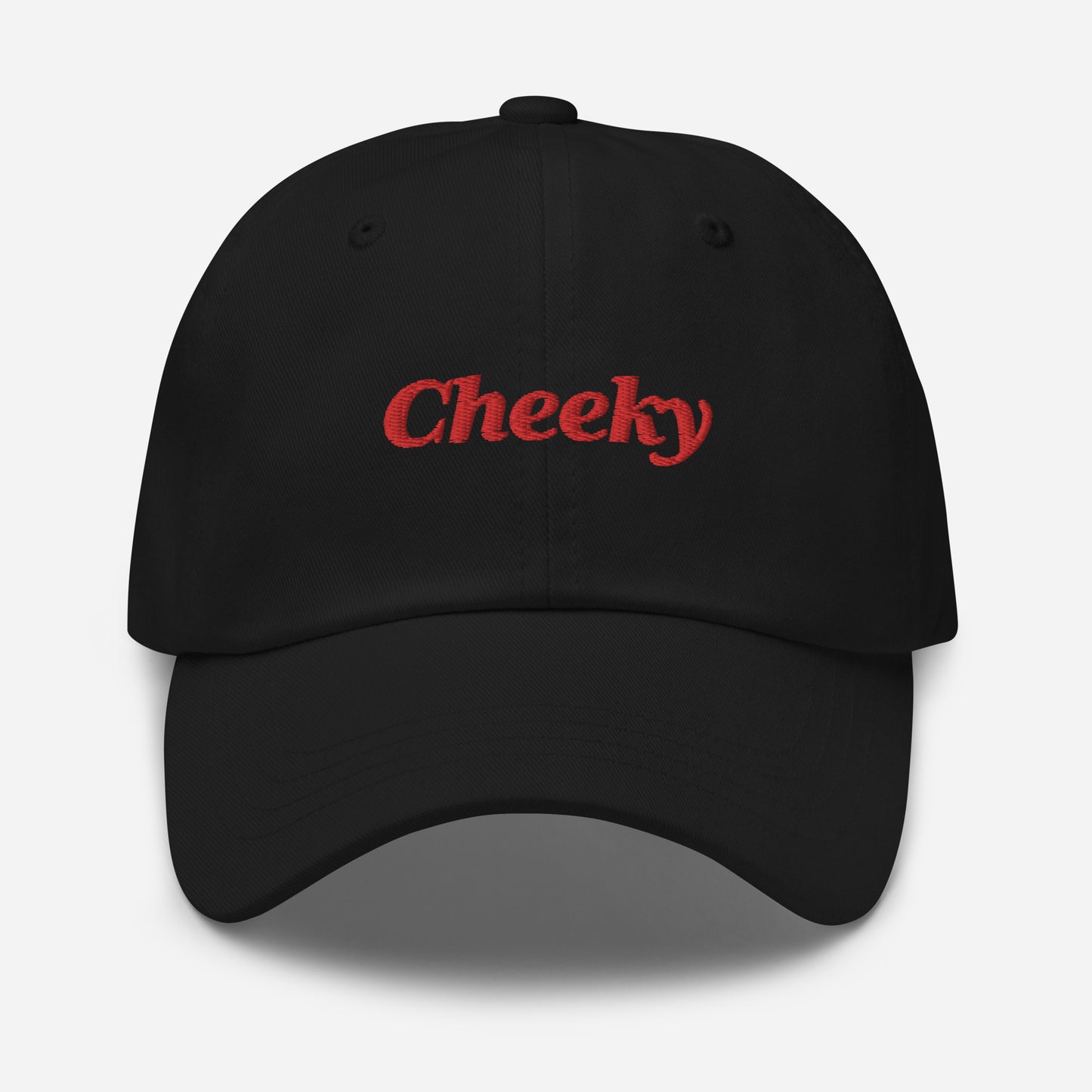 London city editions with “Cheeky” type in red embroidery on black casual dad hat front view on white background