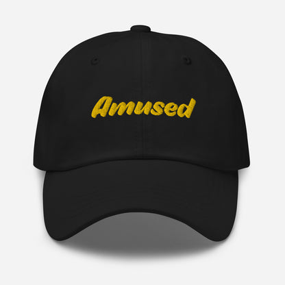 Austin city editions with “Amused” type in yellow embroidery on black casual dad hat front view on white background