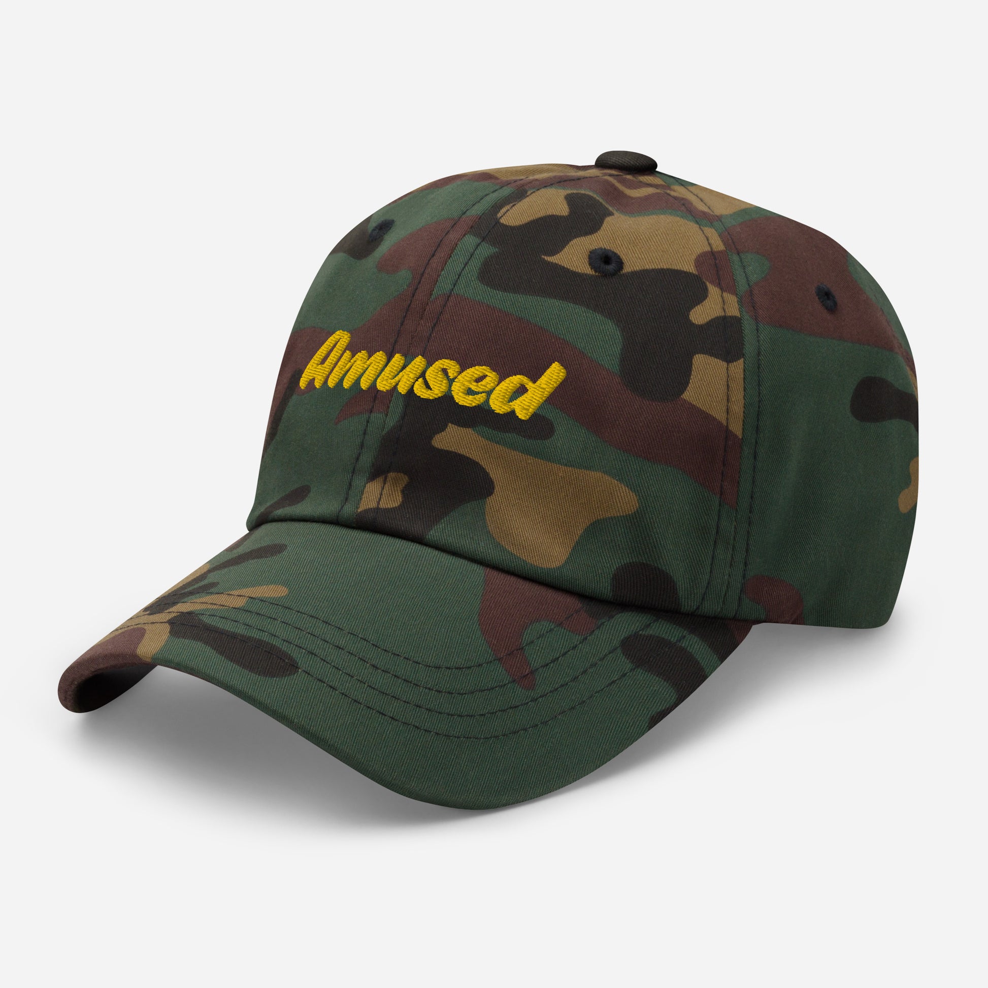 Austin city editions with “Amused” type in yellow embroidery on camo casual dad hat front side view on white background