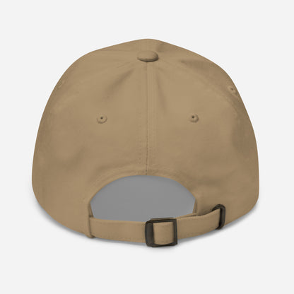 New York city editions with “Driven” type in white embroidery on khaki casual dad hat back view on white background