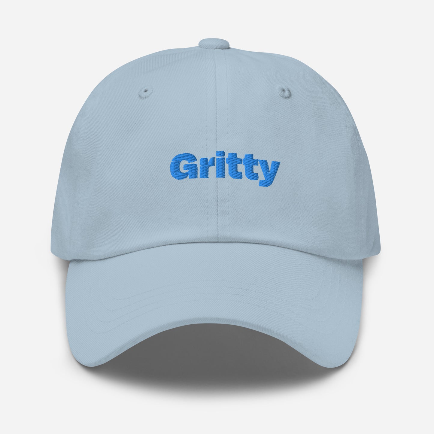 Chicago city editions with “Gritty” type in blue embroidery on light blue casual dad hat front view on white background