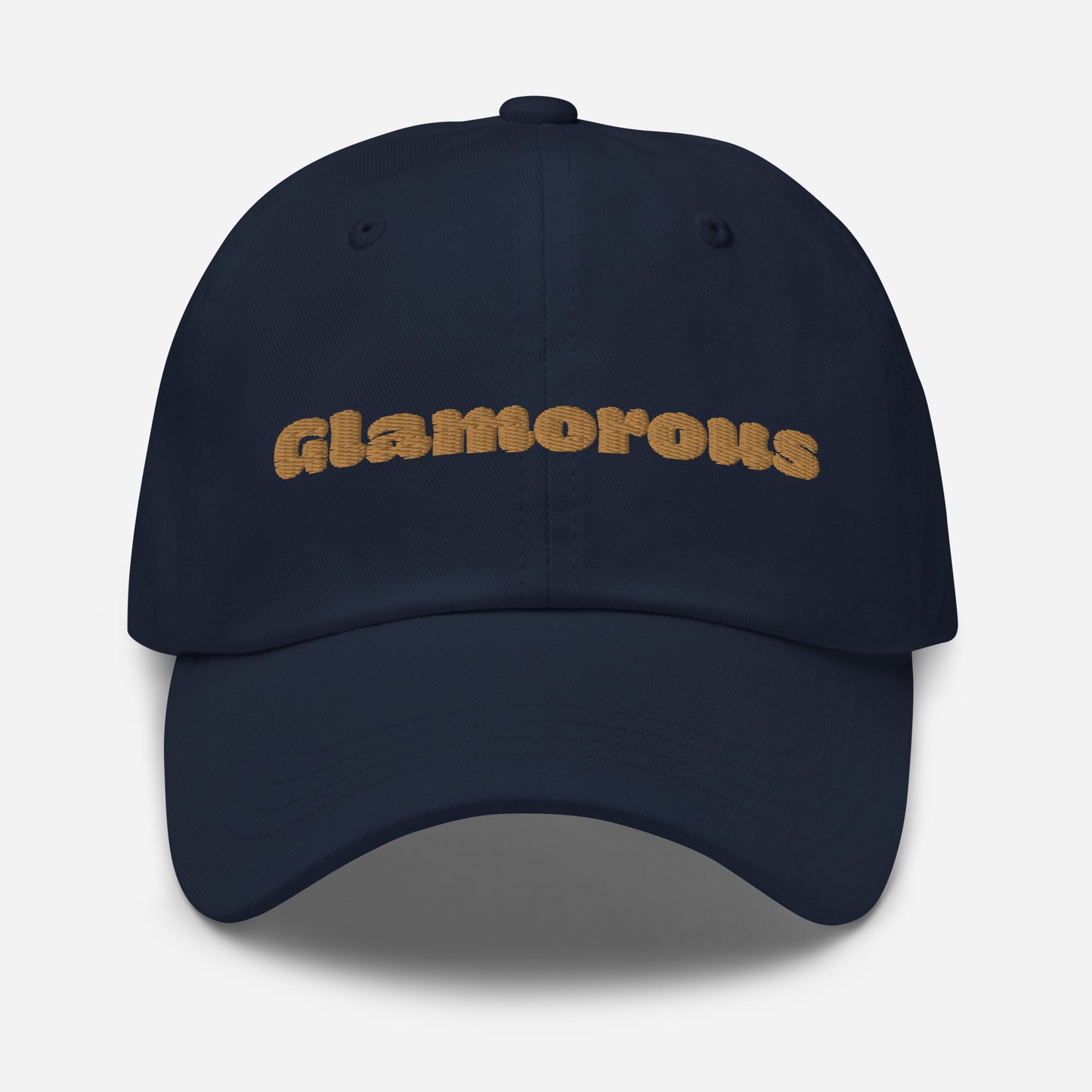 Los Angeles city editions with “Glamorous” type in gold embroidery on navy casual dad hat front view on white background