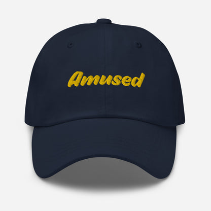 Austin city editions with “Amused” type in yellow embroidery on navy casual dad hat front view on white background