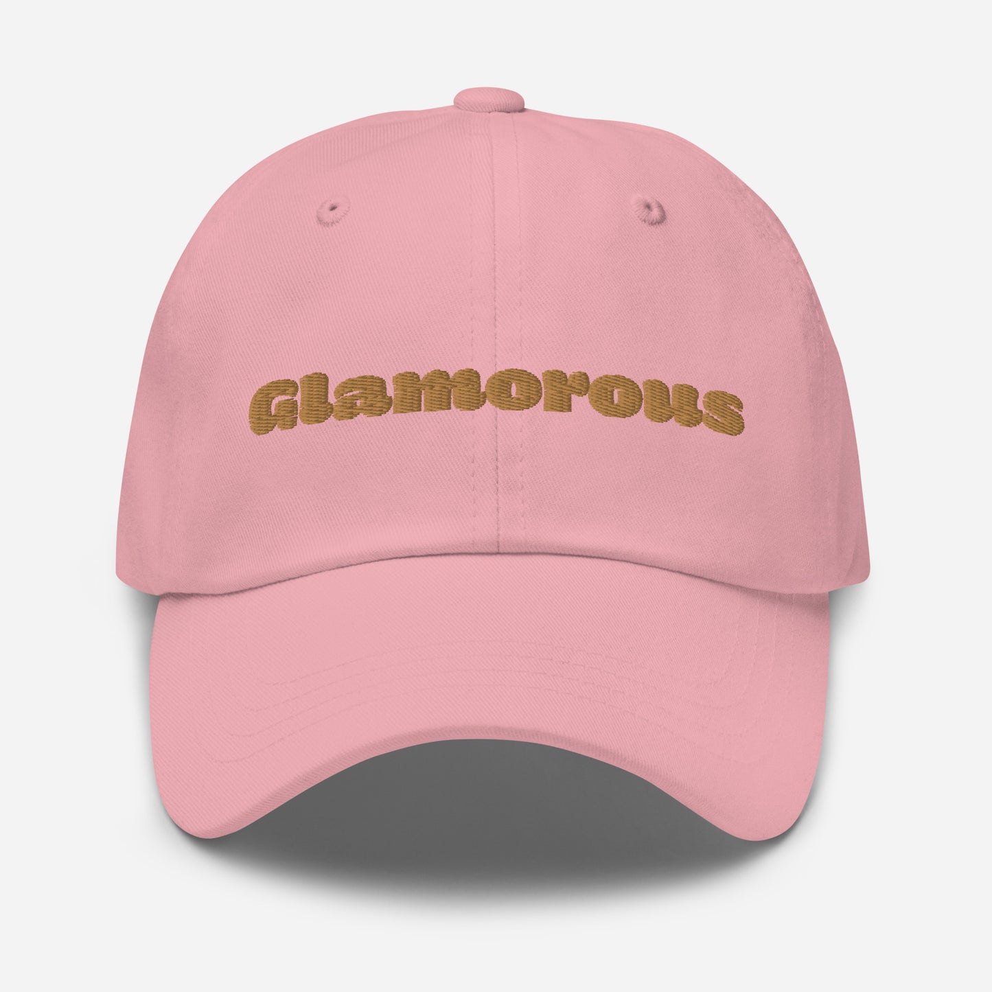 Los Angeles city editions with “Glamorous” type in gold embroidery on pink casual dad hat front view on white background