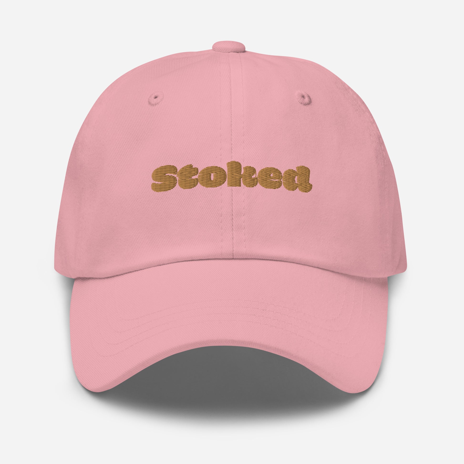 Los Angeles city editions with “Stoked” type in gold embroidery on pink casual dad hat front view on white background