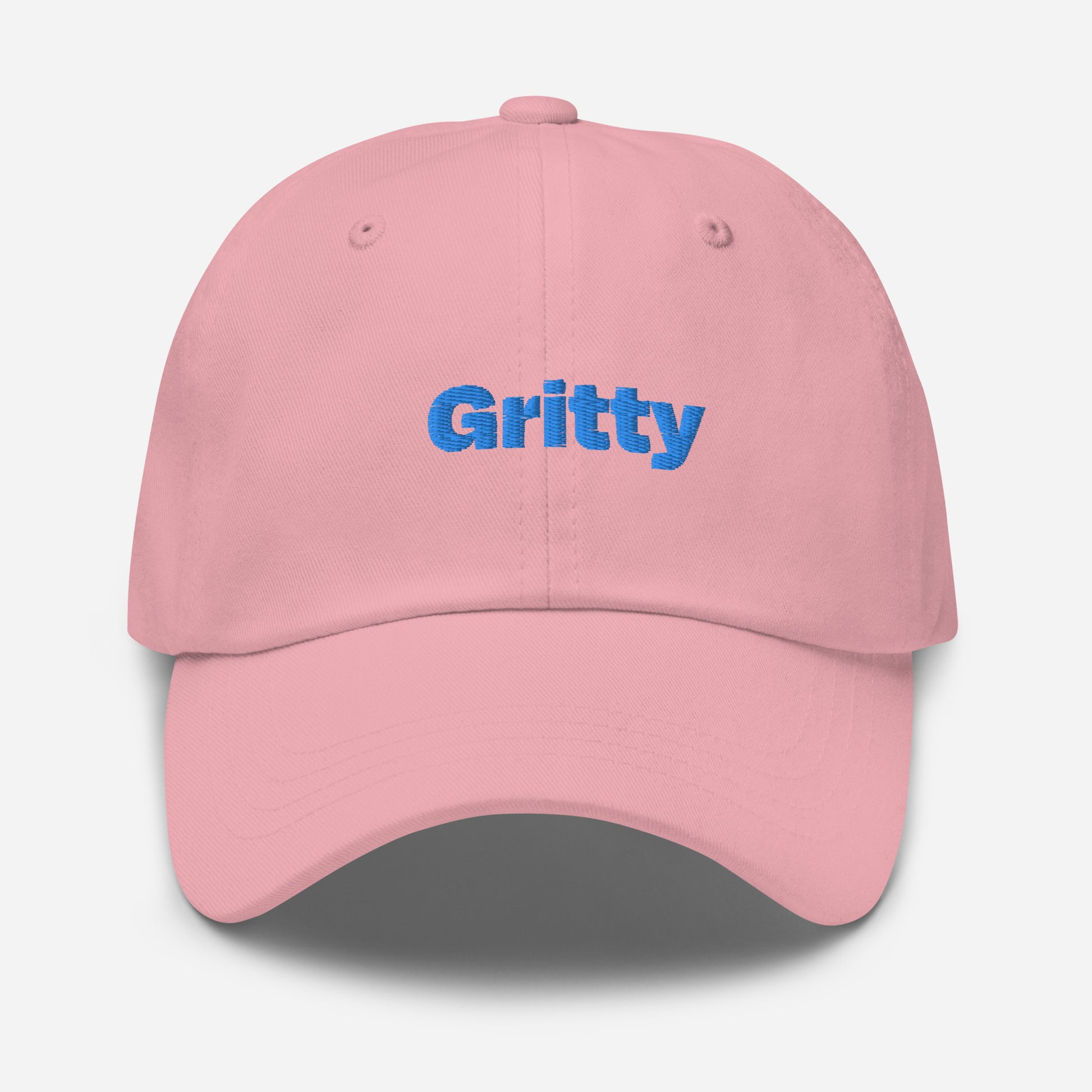 Chicago city editions with “Gritty” type in blue embroidery on pink casual dad hat front view on white background