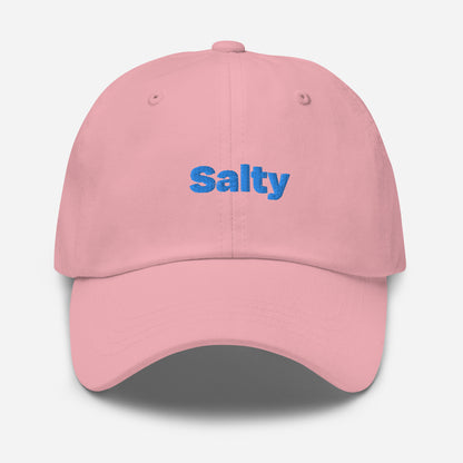 Chicago city editions with “Salty” type in blue embroidery on pink casual dad hat front view on white background