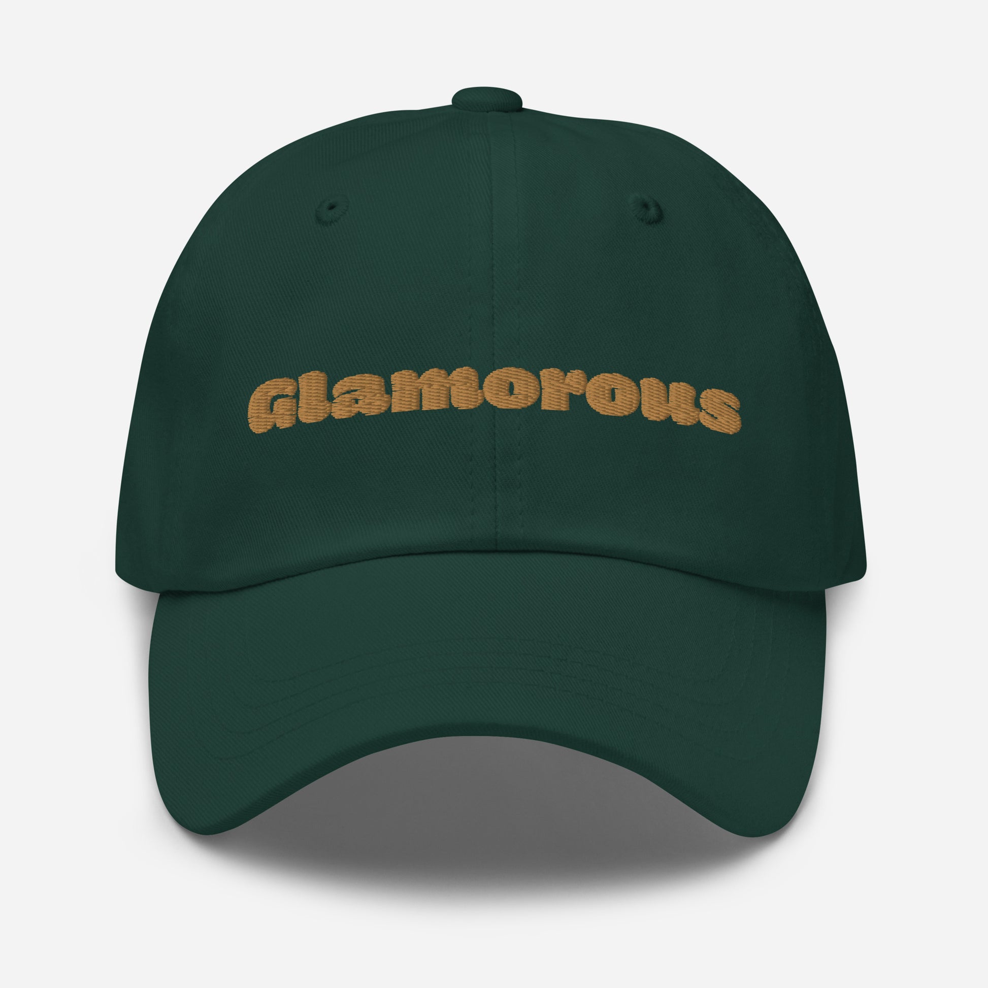 Los Angeles city editions with “Glamorous” type in gold embroidery on green casual dad hat front view on white background