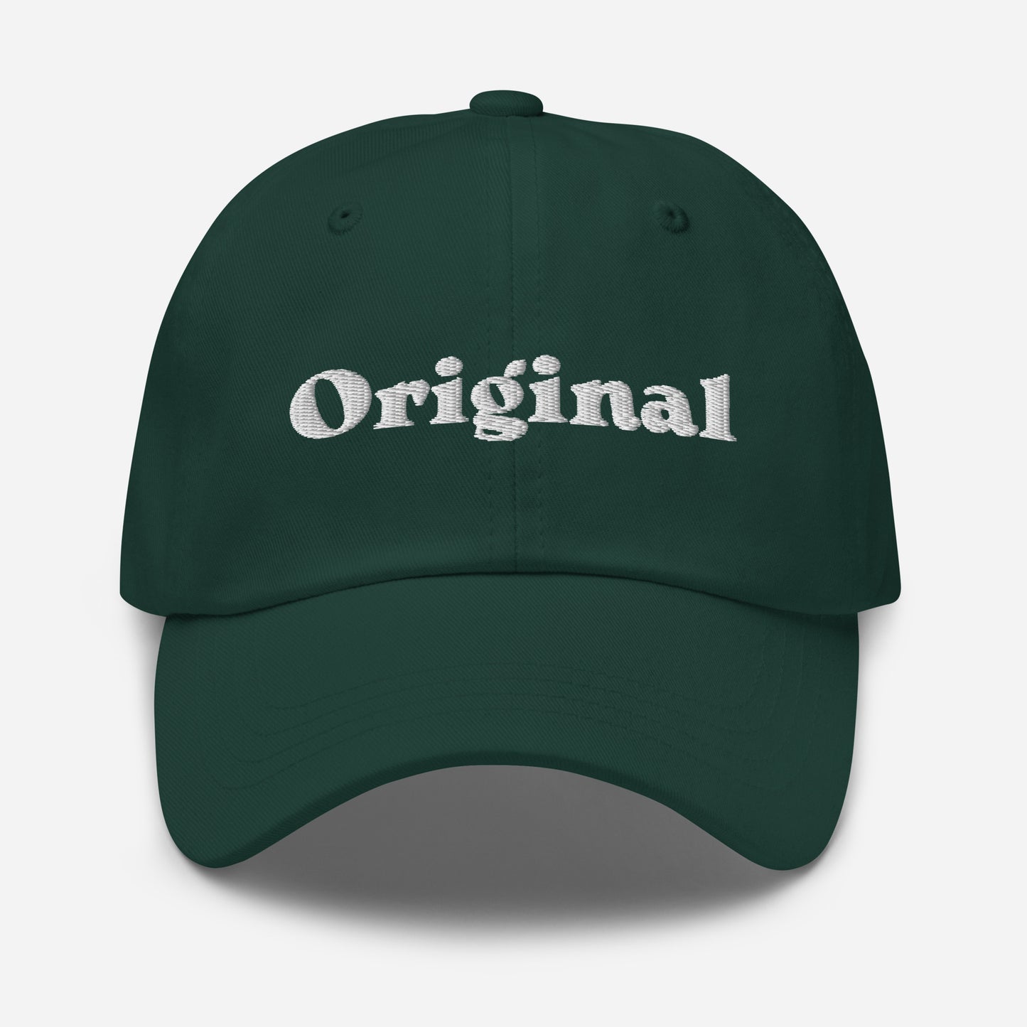 New York city editions with “Original” type in white embroidery on green casual dad hat front view on white background