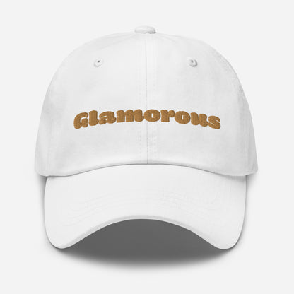 Los Angeles city editions with “Glamorous” type in gold embroidery on white casual dad hat front view on white background