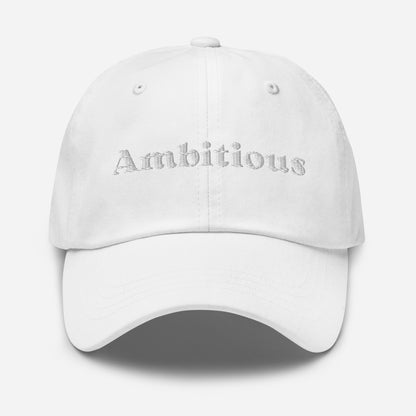 New York city editions with “Ambitious” type in white embroidery on white casual dad hat front view on white background