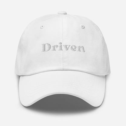 New York city editions with “Driven” type in white embroidery on white casual dad hat front view on white background