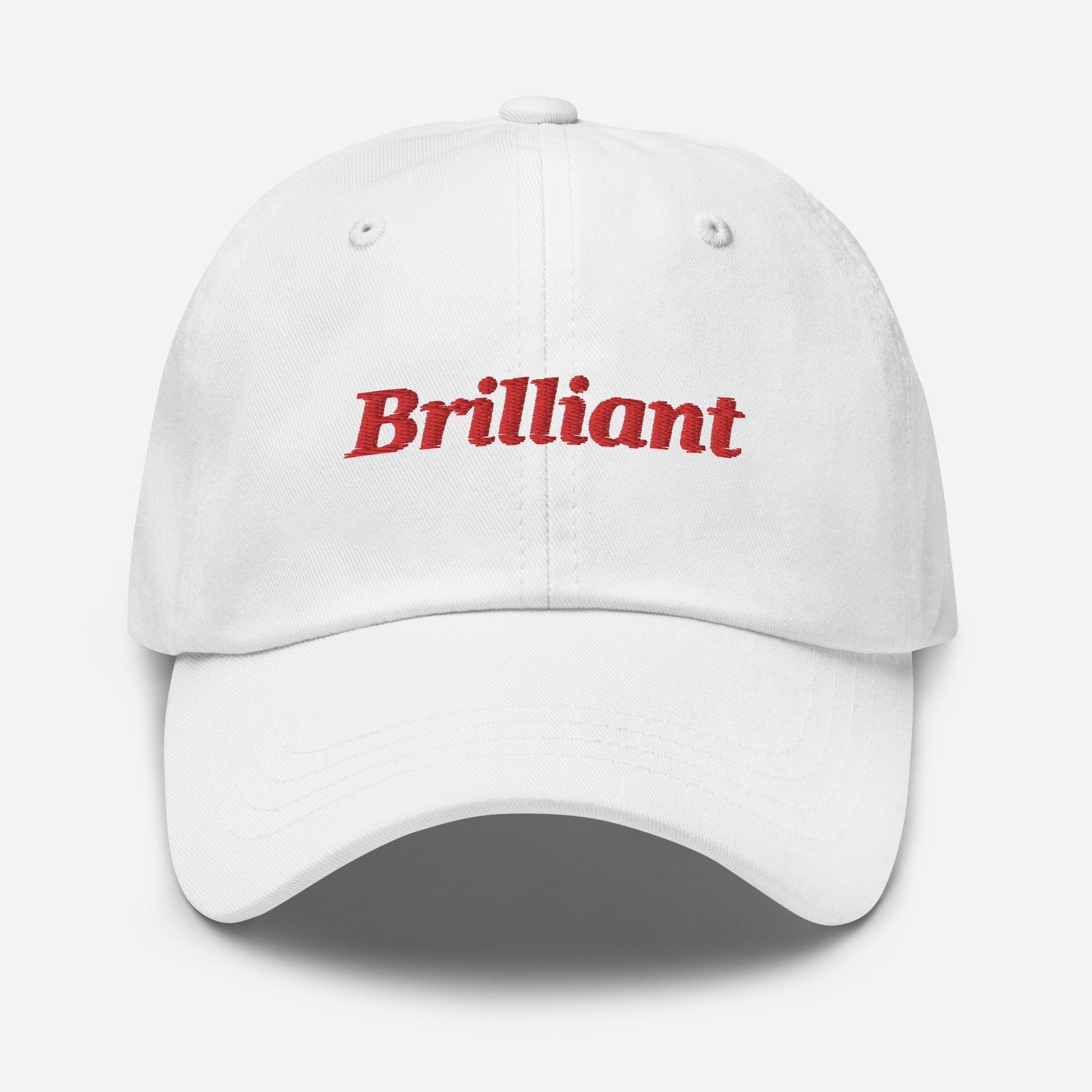 London city editions with “Brilliant” type in red embroidery on white casual dad hat front view on white background