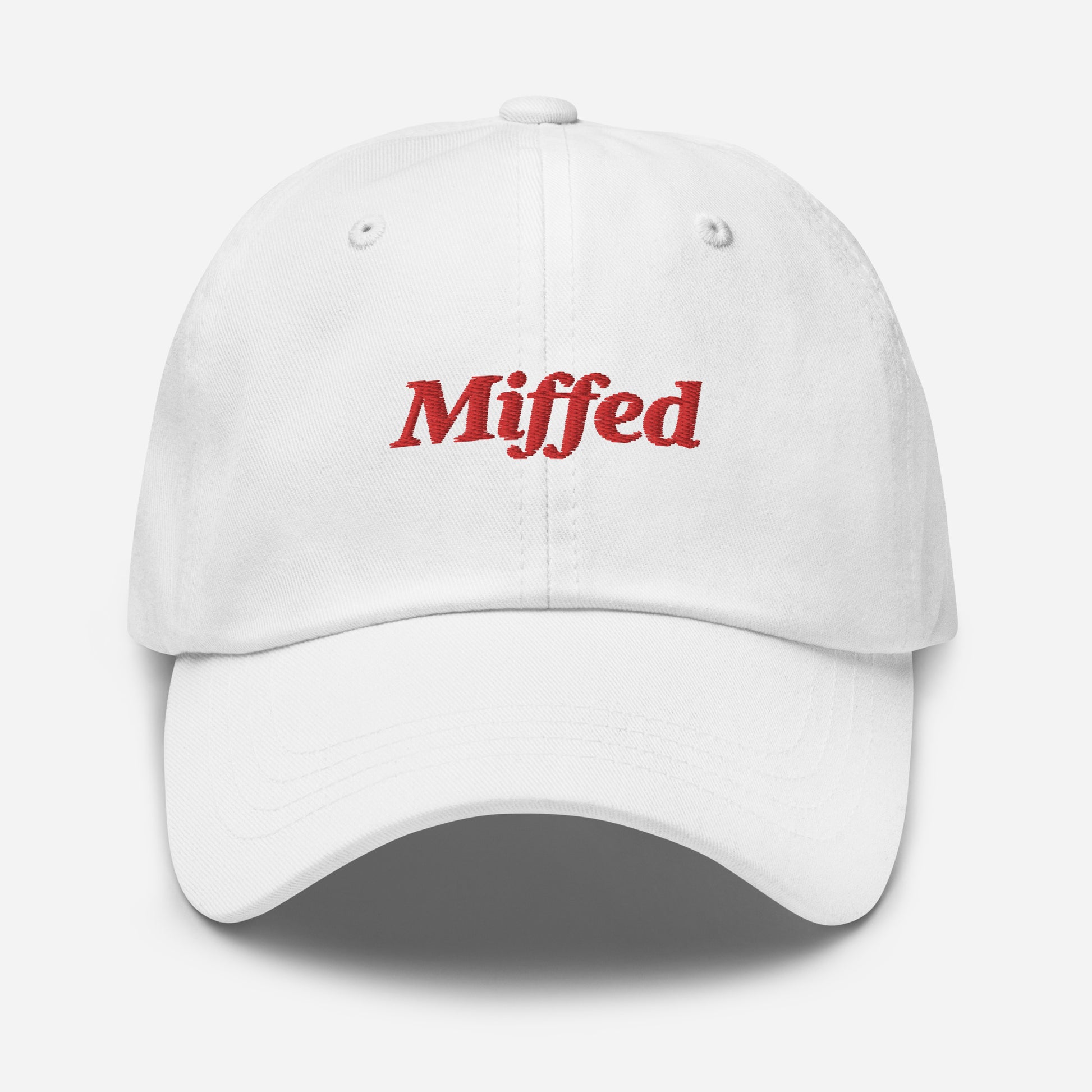 London city editions with “Miffed” type in red embroidery on white casual dad hat front view on white background