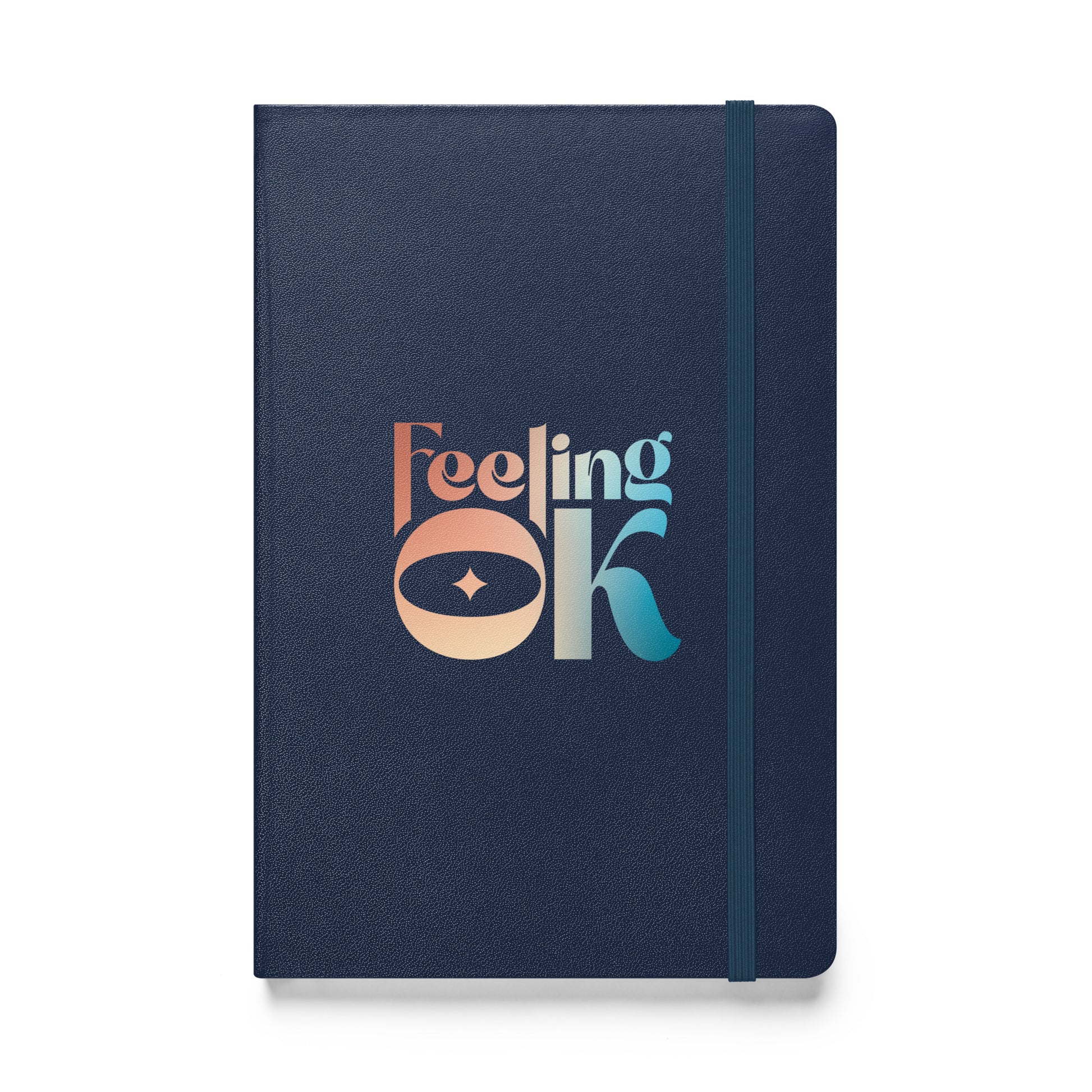 Feeling OK type on navy blue notebook, front view on white background