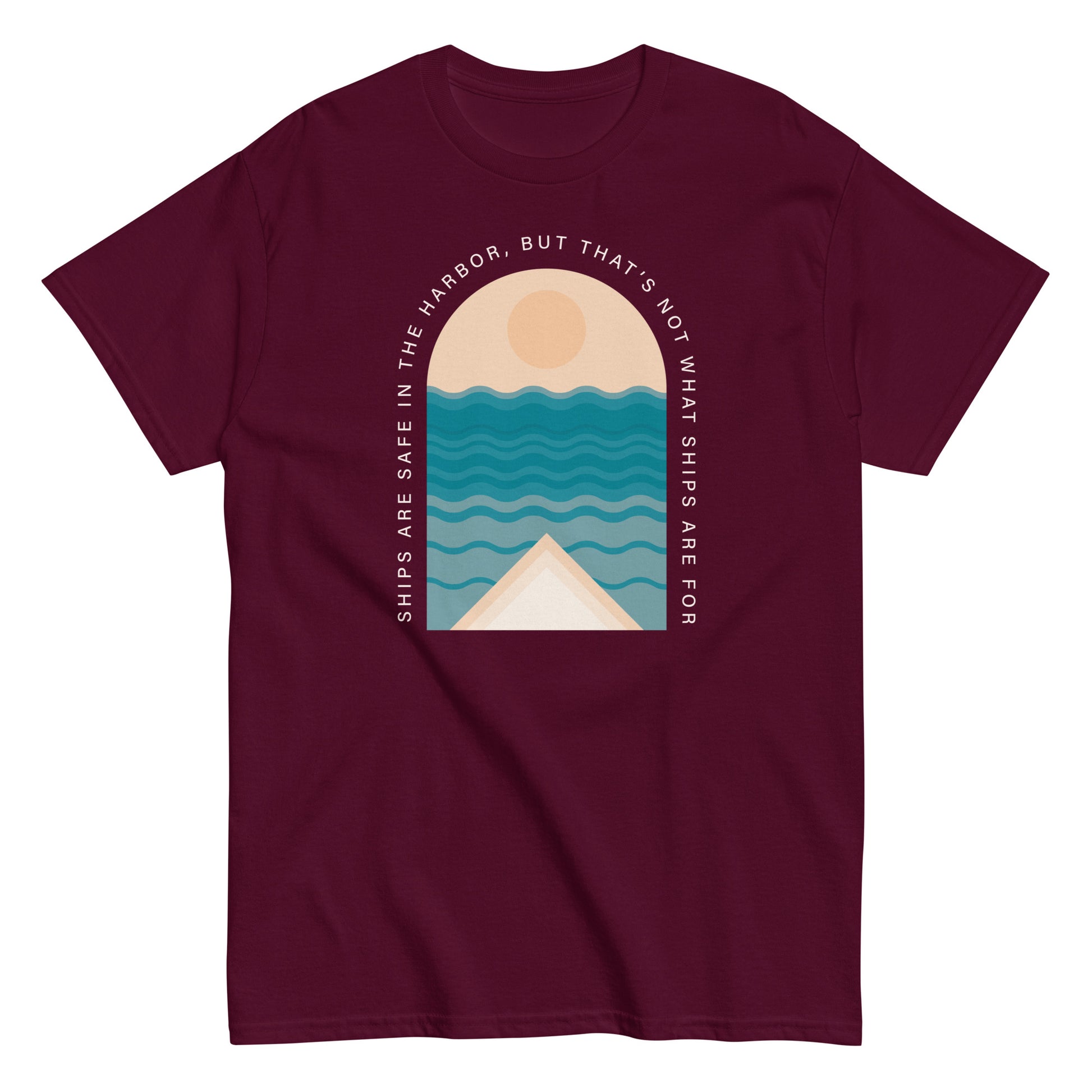 Ships Are Safe In The Harbor, But That's Not What Ships Are For text on burgundy t-shirt, front view on white background