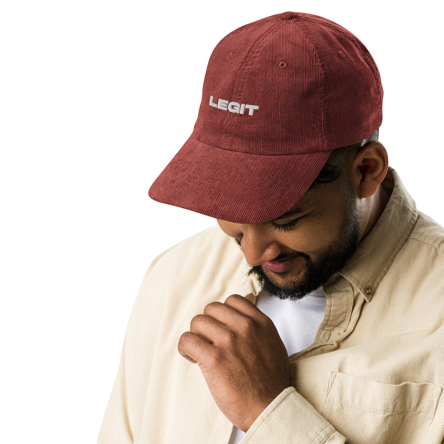 LEGIT, text, type, hat, dad hat, corduroy, cozy, design. front right side view of rust hat on male model