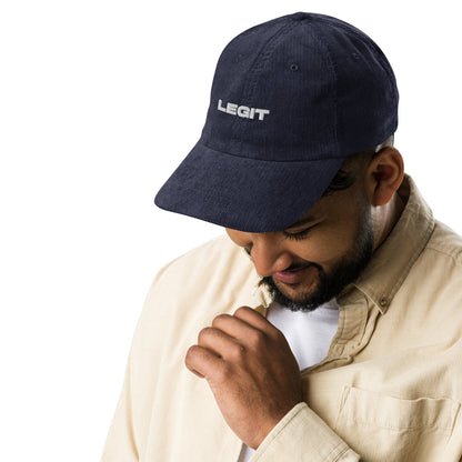 LEGIT, text, type, hat, dad hat, corduroy, cozy, design. front right side view of blue hat on male model